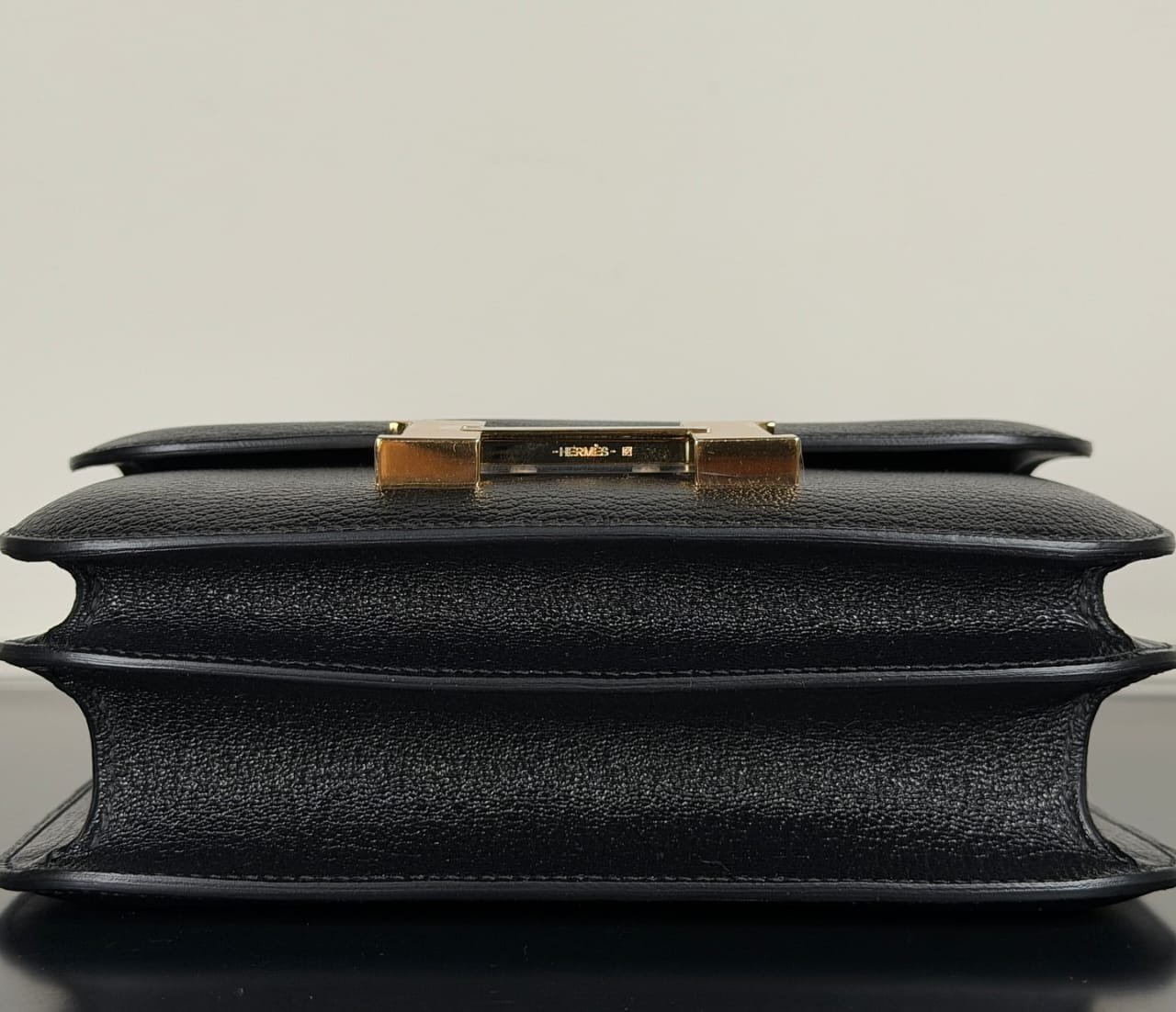 Hermès Constance 18 Black Protective Feet Gold Detail