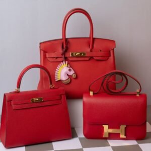Red Hermès Birkin Kelly Constance Collection Flat Lay designer handbag