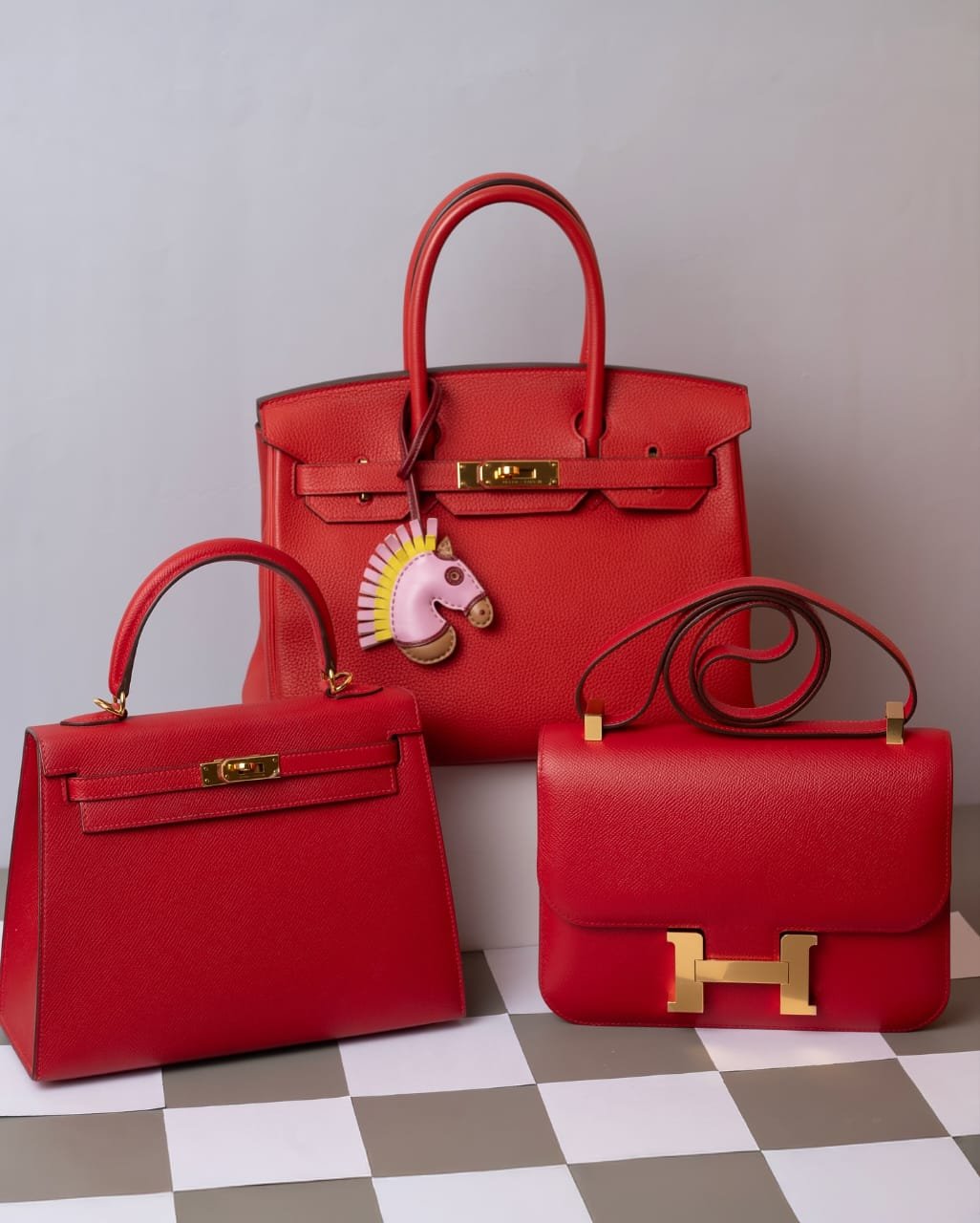 Red Hermès Birkin Kelly Constance Collection Flat Lay designer handbag